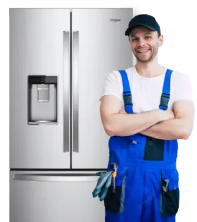 A British boy standing in a white shirt, blue pants and a triple door fridge in front of him